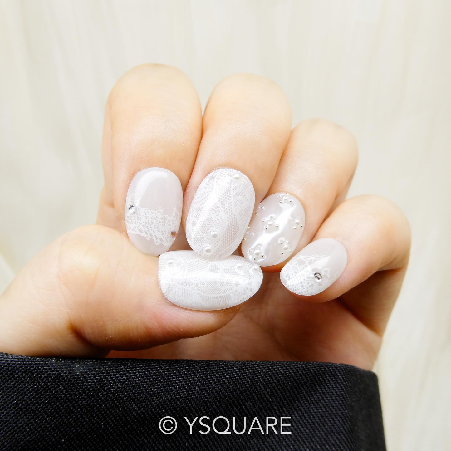 < Dentelle >